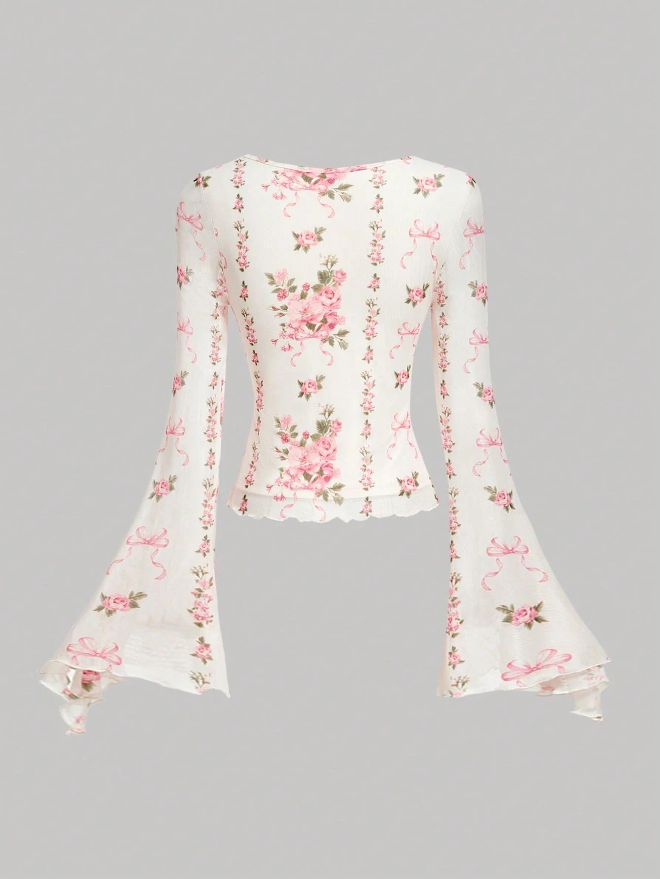 Pink and white floral print tie-front flare sleeve top laid flat against a neutral background