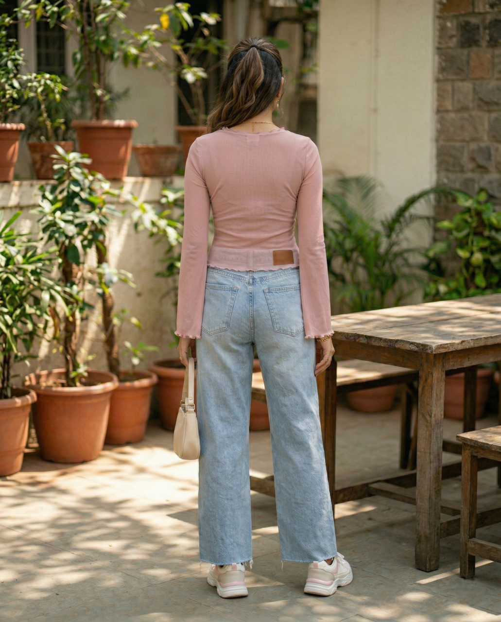 Fashzeo women's rose pink tie-front top with ruffled V-neck and dramatic sheer bell sleeves.