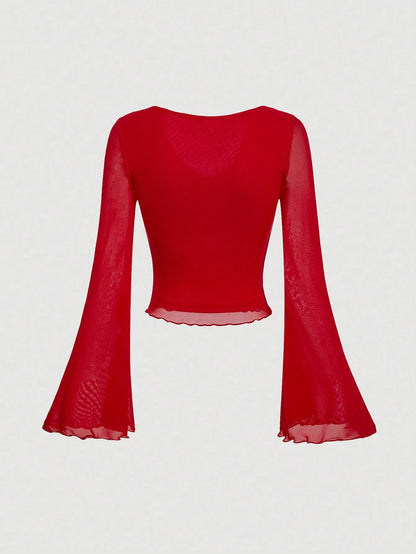 Fashzeo women's rose pink tie-front top with ruffled V-neck and dramatic sheer bell sleeves.