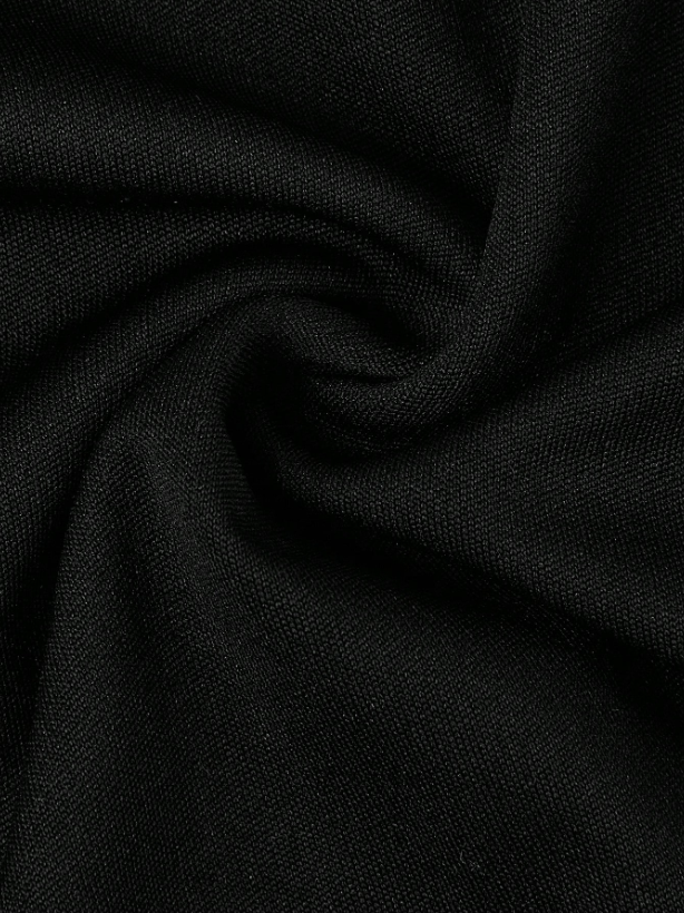 Plus Size Elegant V-Neck Sleeveless Jumpsuit – Wide-Leg Cropped Fit with Double Button Detail