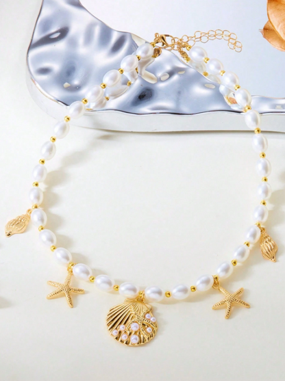 Boho Seashell & Starfish Pendant Necklace for Women – Beach Holiday Gold Chain with Pearl Accents