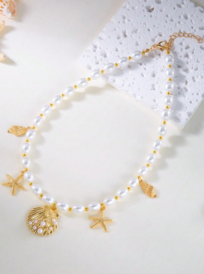 Boho Seashell & Starfish Pendant Necklace for Women – Beach Holiday Gold Chain with Pearl Accents