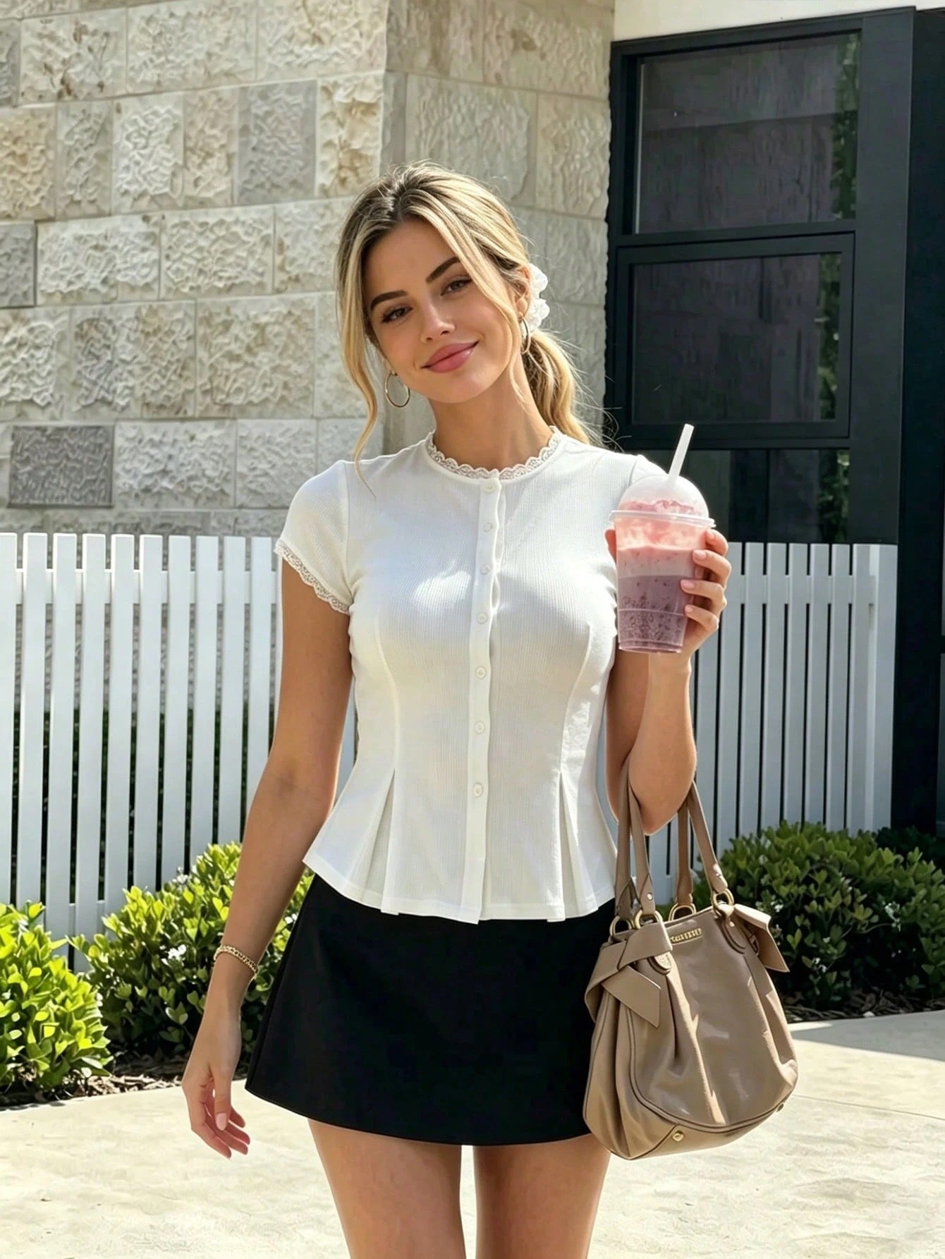 Women's cute ribbed knit lace-trim cap sleeve button-front peplum top in white paired with a black skirt.