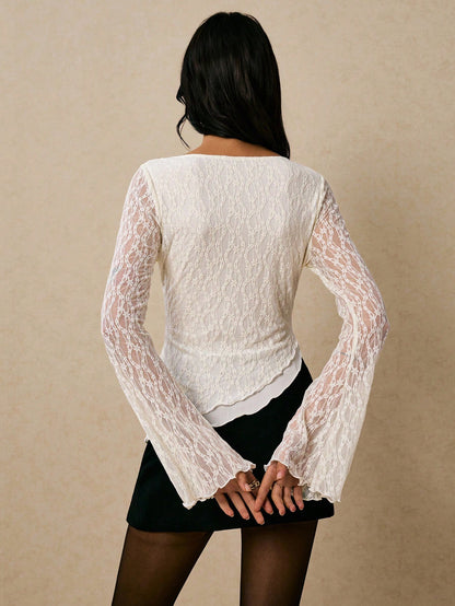 Women's elegant lace flare sleeve asymmetric top in white, brown, red violet, and black paired with a black skirt for a trendy Gen Z look.
