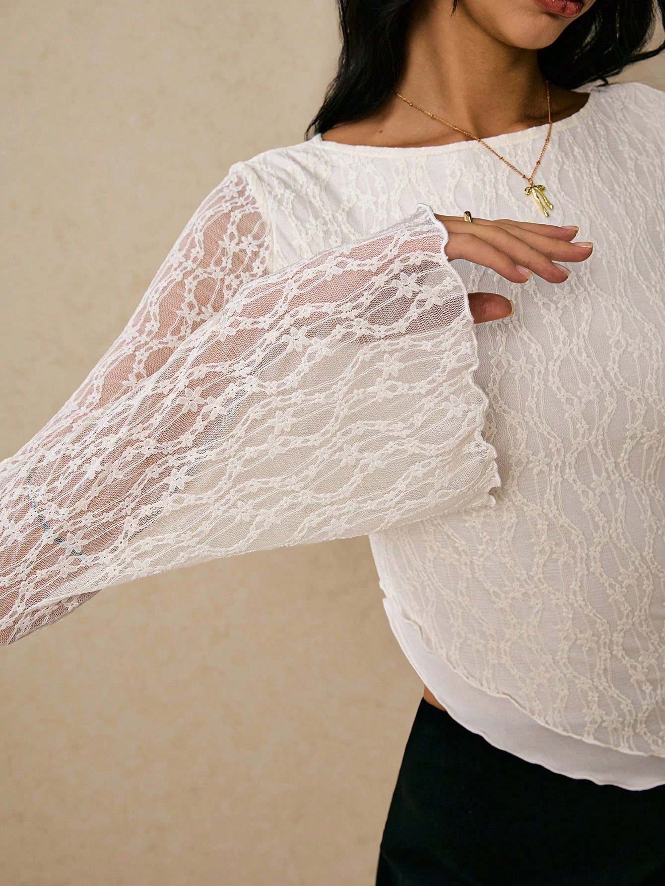 Women's elegant lace flare sleeve asymmetric top in white, brown, red violet, and black paired with a black skirt for a trendy Gen Z look.