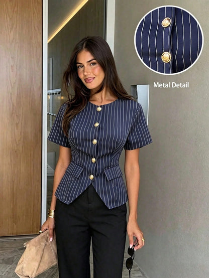 Women's navy blue pinstripe short-sleeve slim-fit peplum top with gold buttons paired with a black skirt for an office chic look.
